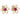 A pair of modern, yellow gold, ruby set stud earrings.