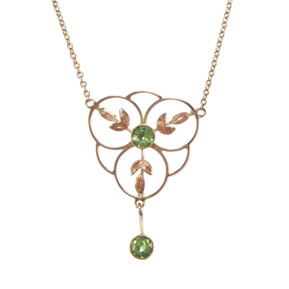  An Edwardian, 9ct rose gold, peridot set pendant & chain
