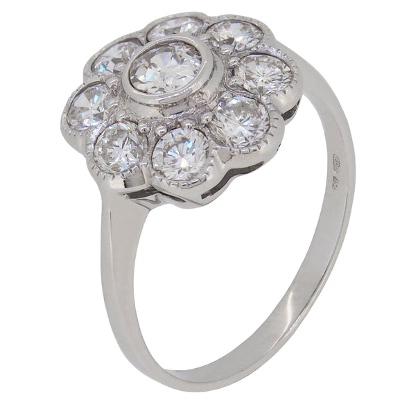 An 18ct white gold, diamond set cluster ring.