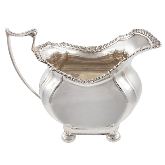 An Edwardian, silver milk jug.