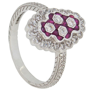 A modern, 18ct white gold, ruby & diamond set cluster ring.