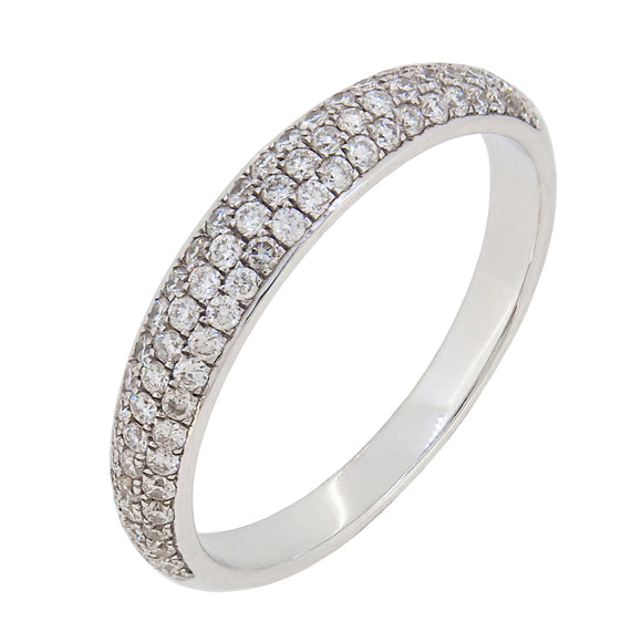A modern, 18ct white gold, diamond set, three row half eternity ring