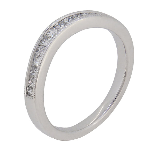 A modern, 18ct white gold, diamond set, twelve stone wedding ring