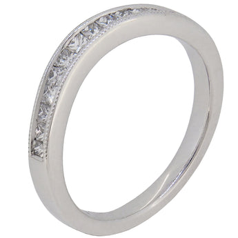 A modern, 18ct white gold, diamond set, twelve stone wedding ring