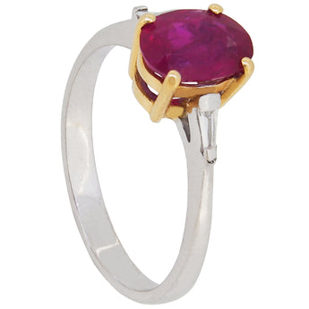 A modern, 18ct white & yellow gold, ruby & diamond set, three stone ring