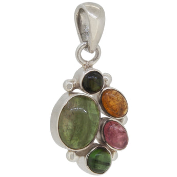 A modern, silver, tourmaline set pendant