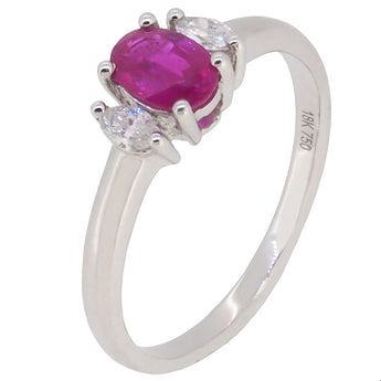 A modern, 18ct white gold, ruby & diamond set, three stone ring.