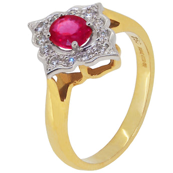 A modern, 18ct yellow & white gold, ruby & diamond set cluster ring.