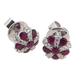 A pair of modern, 18ct white gold, ruby & diamond set, domed cluster stud earring
