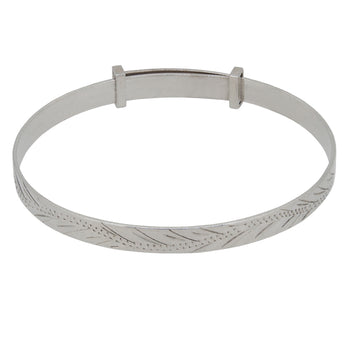 A modern, silver, wave design, child's expanding bangle