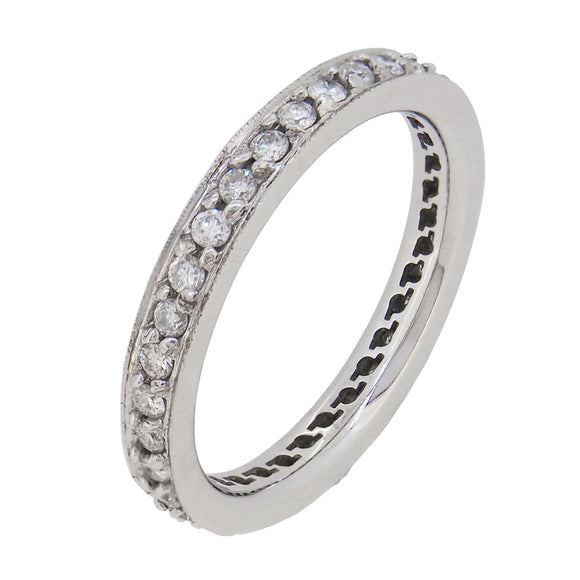 A modern, white metal, diamond set eternity ring