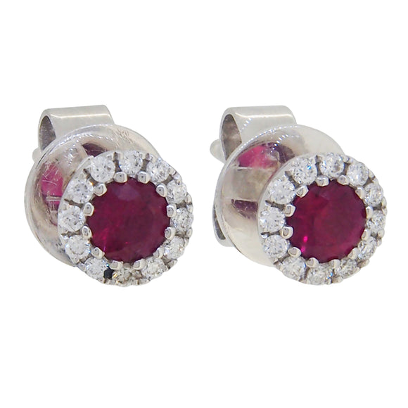 A pair of modern, 18ct white gold, ruby & diamond set cluster stud earrings