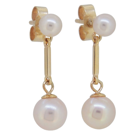 A pair of modern, 9ct yellow gold, pearl set drop earrings