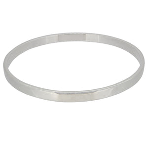 A modern, silver, plain, flat bangle.