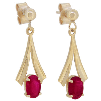 A pair of modern, 9ct yellow gold, ruby set drop earrings.