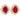 A pair of modern, 9ct yellow gold, ruby set stud earrings.