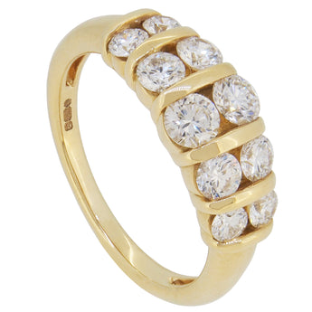 A modern, 18ct yellow gold, diamond set, ten stone ring.