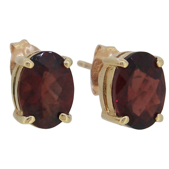 A pair of modern, 9ct yellow gold, garnet set stud earrings.
