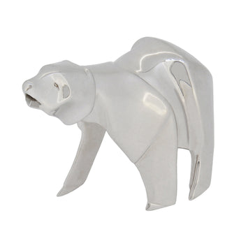 A modern, silver, origami style model of a polar bear.
