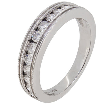 A modern, 18ct white gold, diamond set, eleven stone half eternity ring.