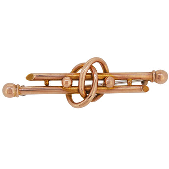 An early 20th century, 9ct rose gold, ball & loop double bar brooch.