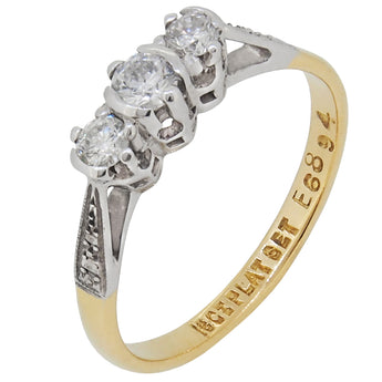 An early 20th century, 18ct yellow gold & platinum, diamond set, three stone ring.