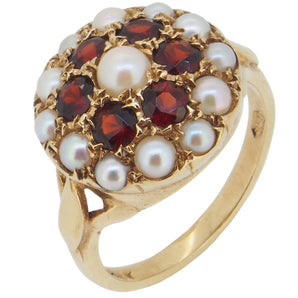 A modern, 9ct yellow gold, garnet & pearl set cluster ring.