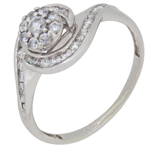 A modern, 9ct white gold, diamond set cluster crossover ring.