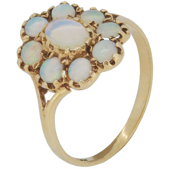 A modern, 9ct yellow gold, opal set cluster ring.
