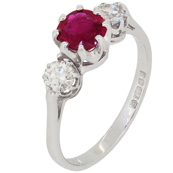 A mid 20th century, 18ct white gold, ruby & diamond set, three stone ring