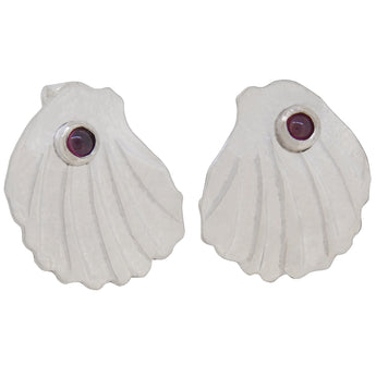 A pair of modern, silver, garnet set shell earrings