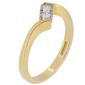 A modern, 18ct yellow gold, diamond set, two stone crossover ring.