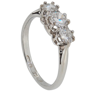 An early 20th century, 18ct white gold with platinum setting, diamond set, three stone ring.