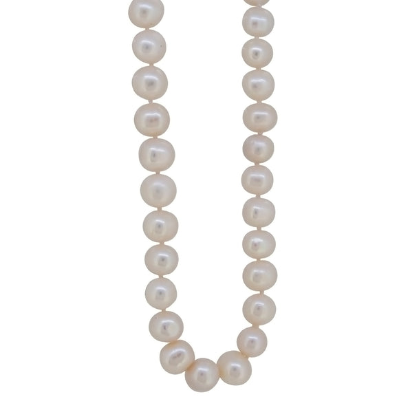 A modern, single row of cultured freshwater pearls on a silver toggle