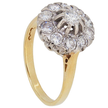 A modern, 18ct yellow & white gold, diamond set cluster ring.