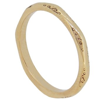 A mid-20th century, 9ct yellow gold, faceted wedding ring.