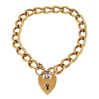 A mid-20th century, 9ct yellow gold, solid, curb link bracelet with a padlock clasp.