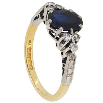 A mid-20th century, 18ct yellow gold, sapphire & diamond set seven stone ring.