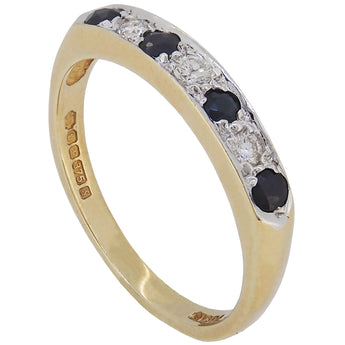A modern, 9ct yellow gold, sapphire & diamond set, seven stone half eternity ring.