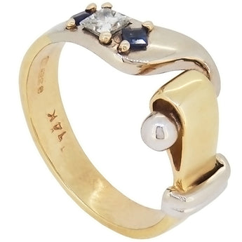 A modern, 14ct yellow & white gold, sapphire & princess cut diamond set, three stone, abstract hook ring.