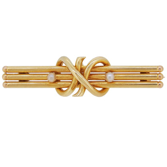 An early 20th century, 15ct yellow gold, pearl set, two stone, three bar brooch