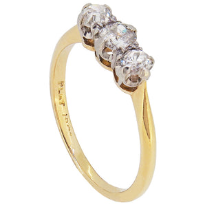 An early 20th century, 18ct yellow gold & platinum setting, diamond set three stone ring