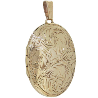 A modern, 9ct yellow gold, engraved oval locket