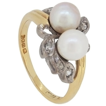 A mid-20th century, 18ct yellow gold, pearl & diamond set crossover ring.