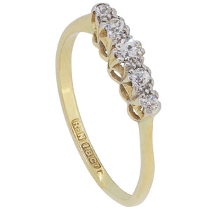A mid-20th century, 18ct yellow gold, diamond set, five stone half hoop ring.