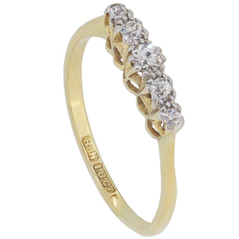 A mid-20th century, 18ct yellow gold, diamond set, five stone half hoop ring