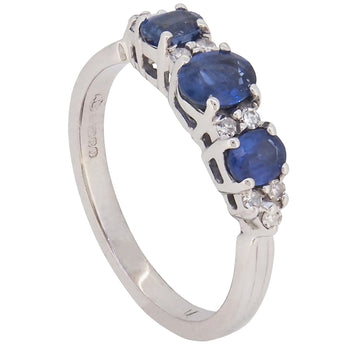 A modern, 9ct white gold, sapphire & diamond set, thirteen stone half hoop ring
