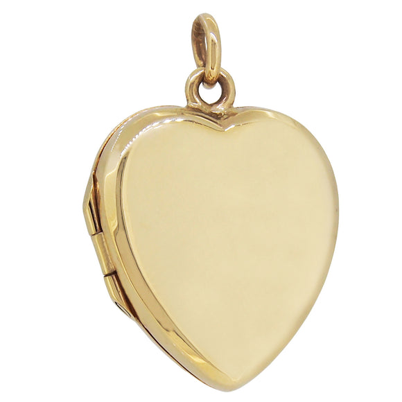A mid-20th century, 9ct yellow gold, heart shaped locket