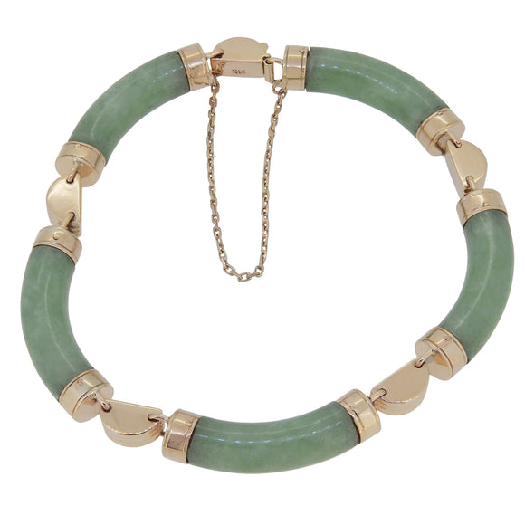 An early 20th century, 9ct yellow gold, jade set bracelet