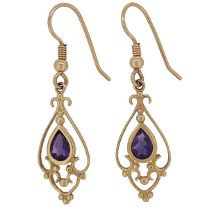 A pair of modern, 9ct yellow gold, amethyst set drop earrings